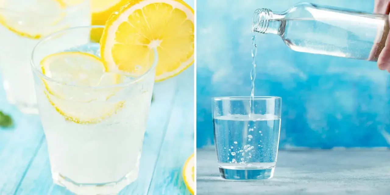 Frisk sodavatten till drinkar, med citron och is, hälls upp i ett glas.