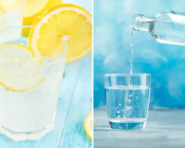 Frisk sodavatten till drinkar, med citron och is, hälls upp i ett glas.